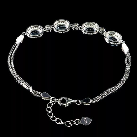 NWT 14K WHITE GOLD Oval Sky Blue Topaz Bracelet 8 Ins - Picture 3 of 5